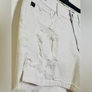 Women's Ripped Mid Rise Stretchy Denim Jeans Shorts.